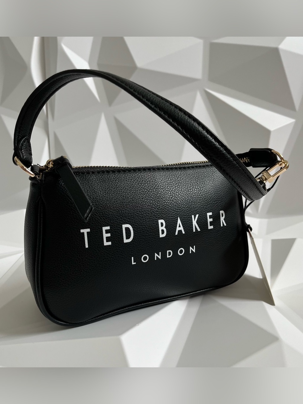 Ted Baker Versatile and Contemporary Look Shoulder Or Convertible Wristlet Bag